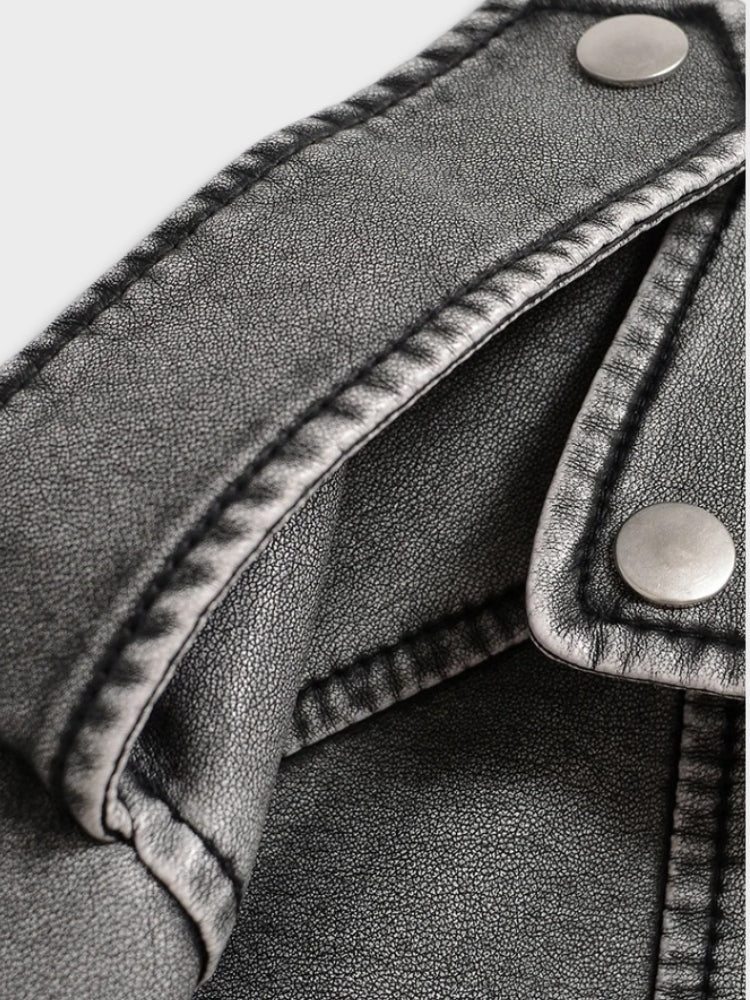 Women's cropped biker jacket in washed faux leather with an asymmetric zip and belt