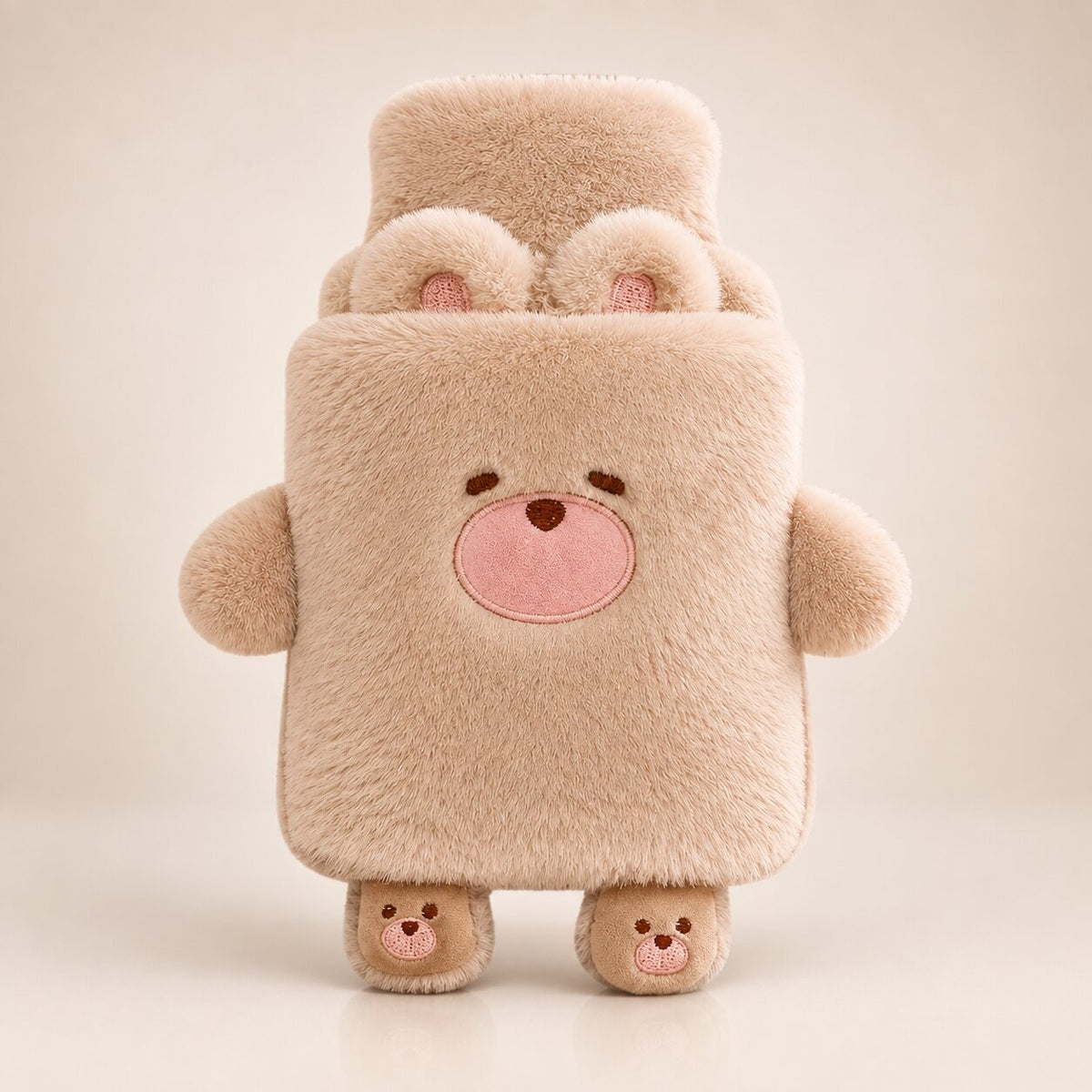 Hot water bottle with a cuddly animal cover with little arms and feet - light brown bear