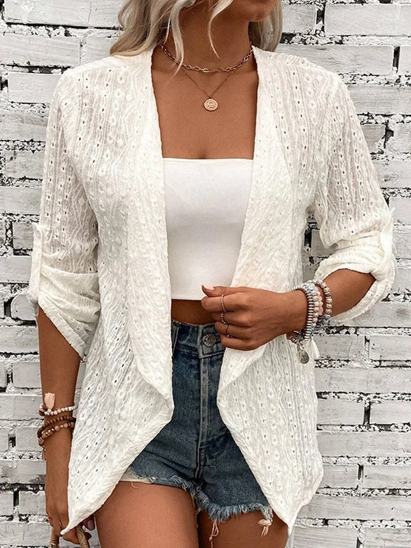 Light openwork knit jacket with a collarless neckline and button front in white