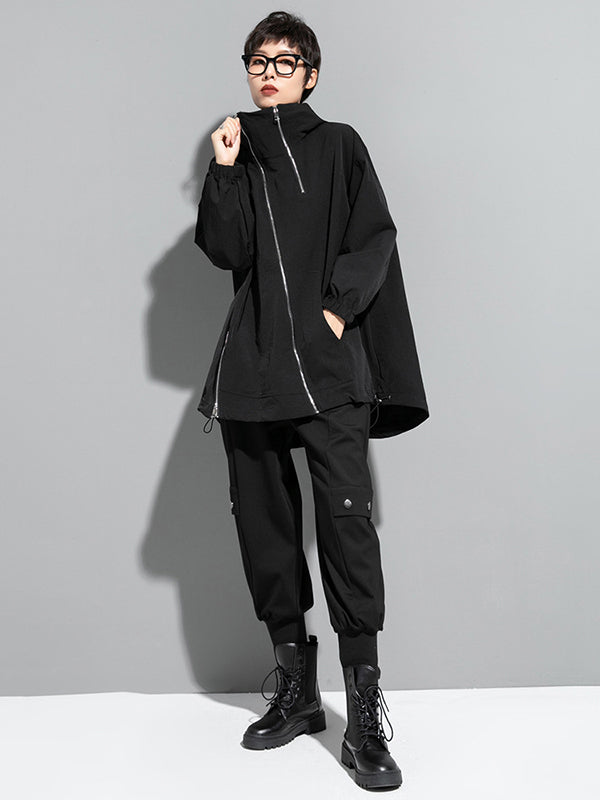 Oversized black hooded jacket with an off-centre zip and drawstring hem