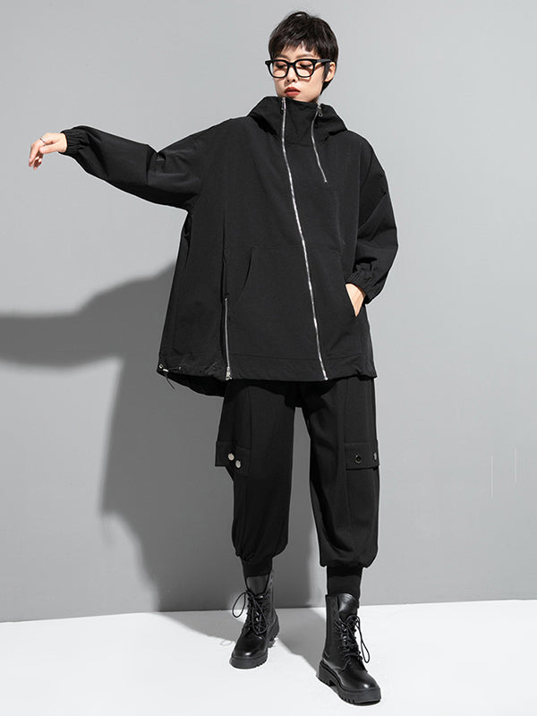 Oversized black hooded jacket with an off-centre zip and drawstring hem