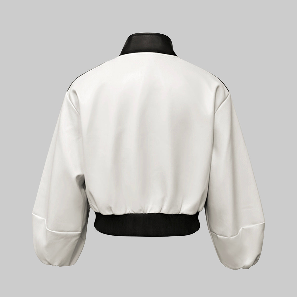 Cropped cream bomber jacket with black contrast panels and a zip front