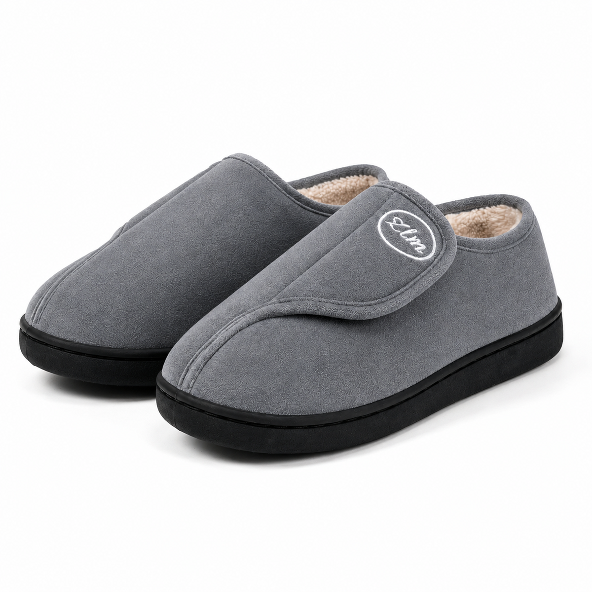 Unisex wide-fit slippers in a suede look with a touch-close strap and fleece lining in grey
