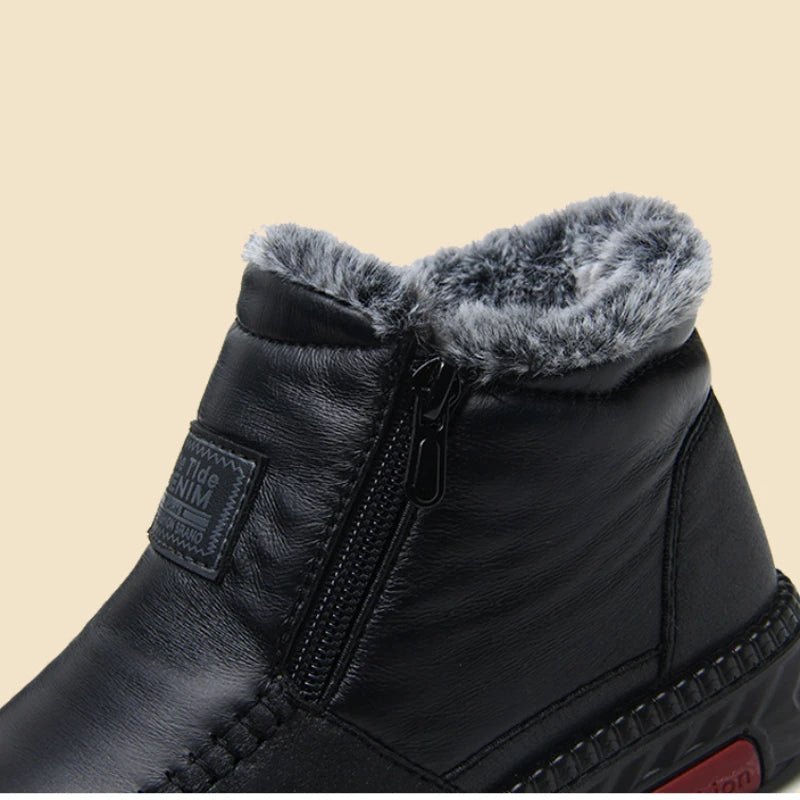 Leather-look ankle boots with a side zip and a thick faux fur lining