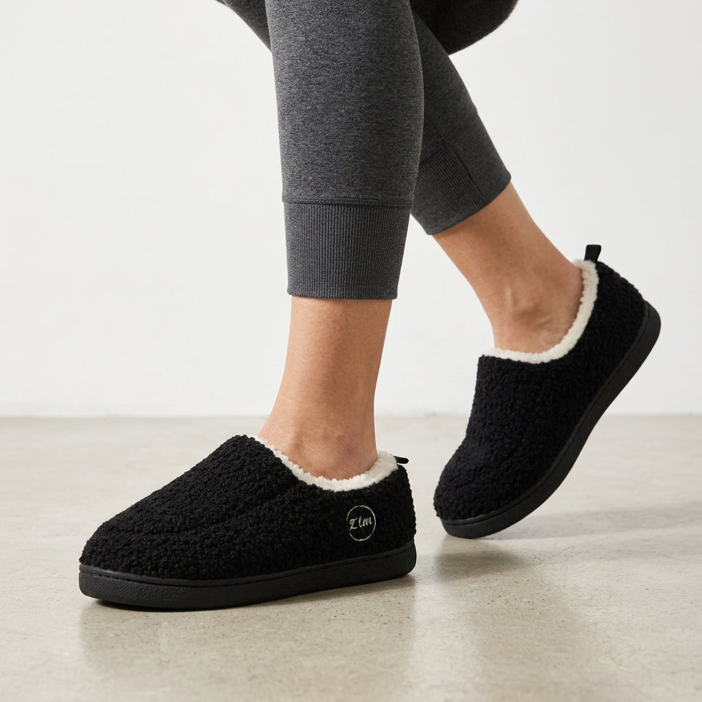 Unisex sherpa loafer slippers with a fleece collar and a heel tab