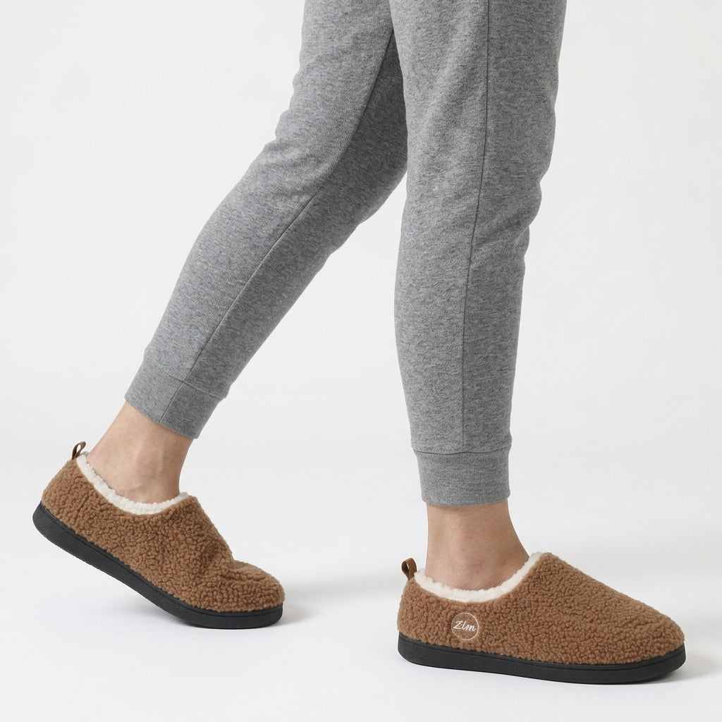 Unisex sherpa loafer slippers with a fleece collar and a heel tab