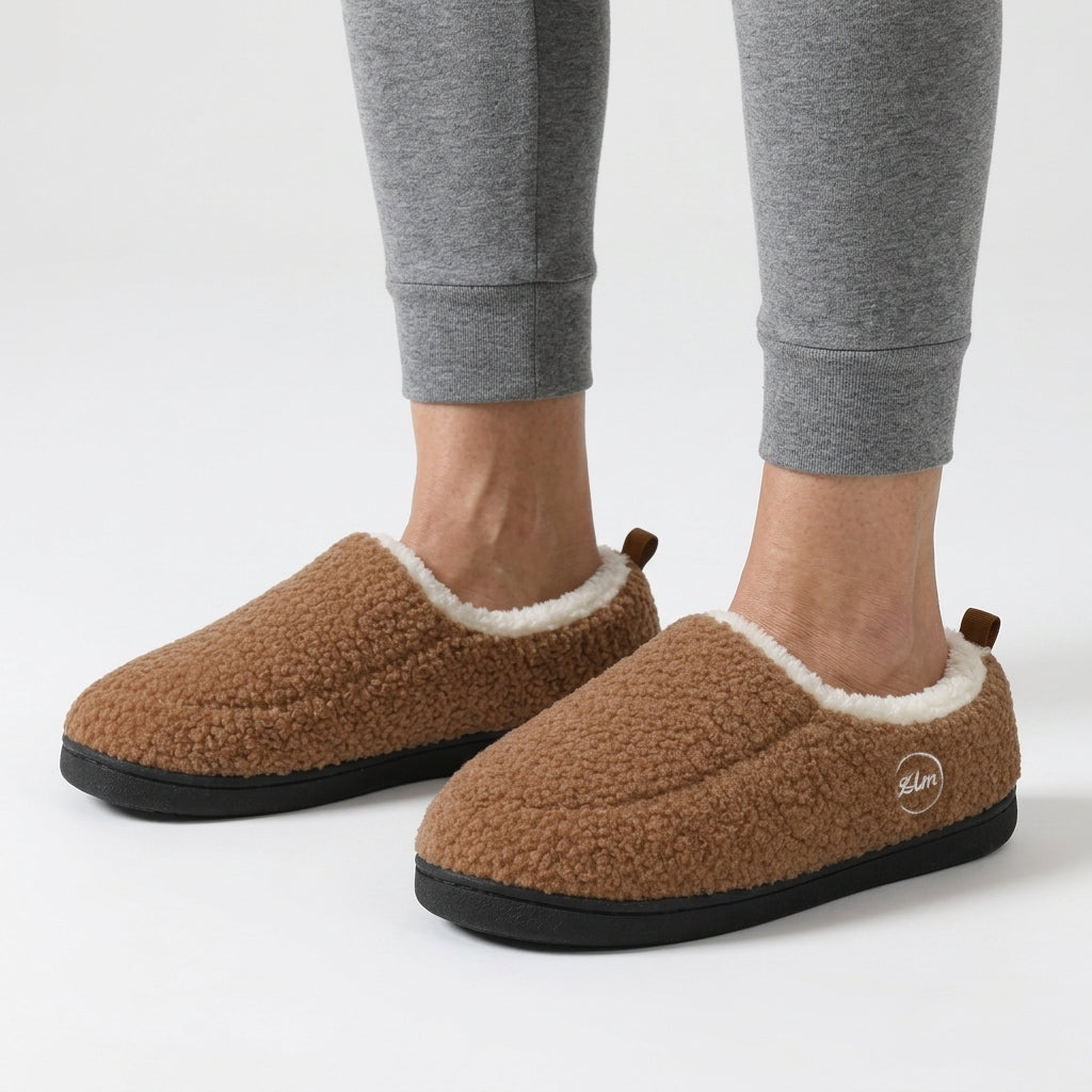 Unisex sherpa loafer slippers with a fleece collar and a heel tab