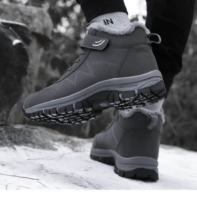 Unisex winter boots with a velcro strap over the lace and a fur lining