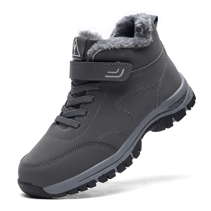 Unisex winter boots with a velcro strap over the lace and a fur lining in grey