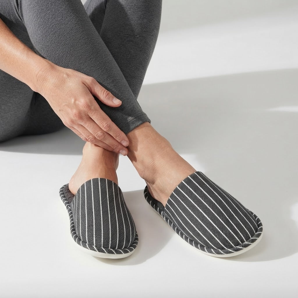 Unisex pinstriped mule slippers with a soft lining and a piped edge