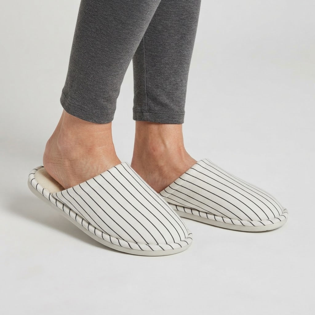 Unisex pinstriped mule slippers with a soft lining and a piped edge
