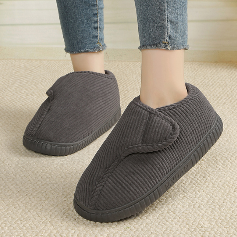 Unisex corduroy house shoes with an adjustable strap and a fleece lining