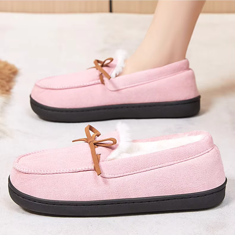 Women's moccasin slippers with a tied bow and a fleece lining