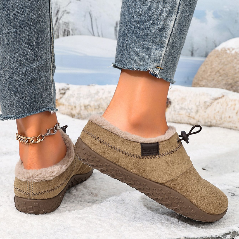 Women's fleece-lined slip-on shoes with an elastic toggle lace and a rubber sole