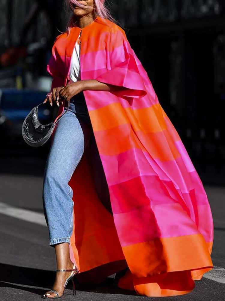 Floor-length open duster coat in wide pink and orange stripes in pink / orange