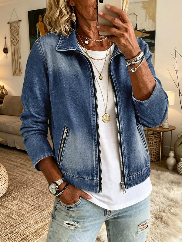 Denim jacket with a zip front and slanted zip pockets in mid wash