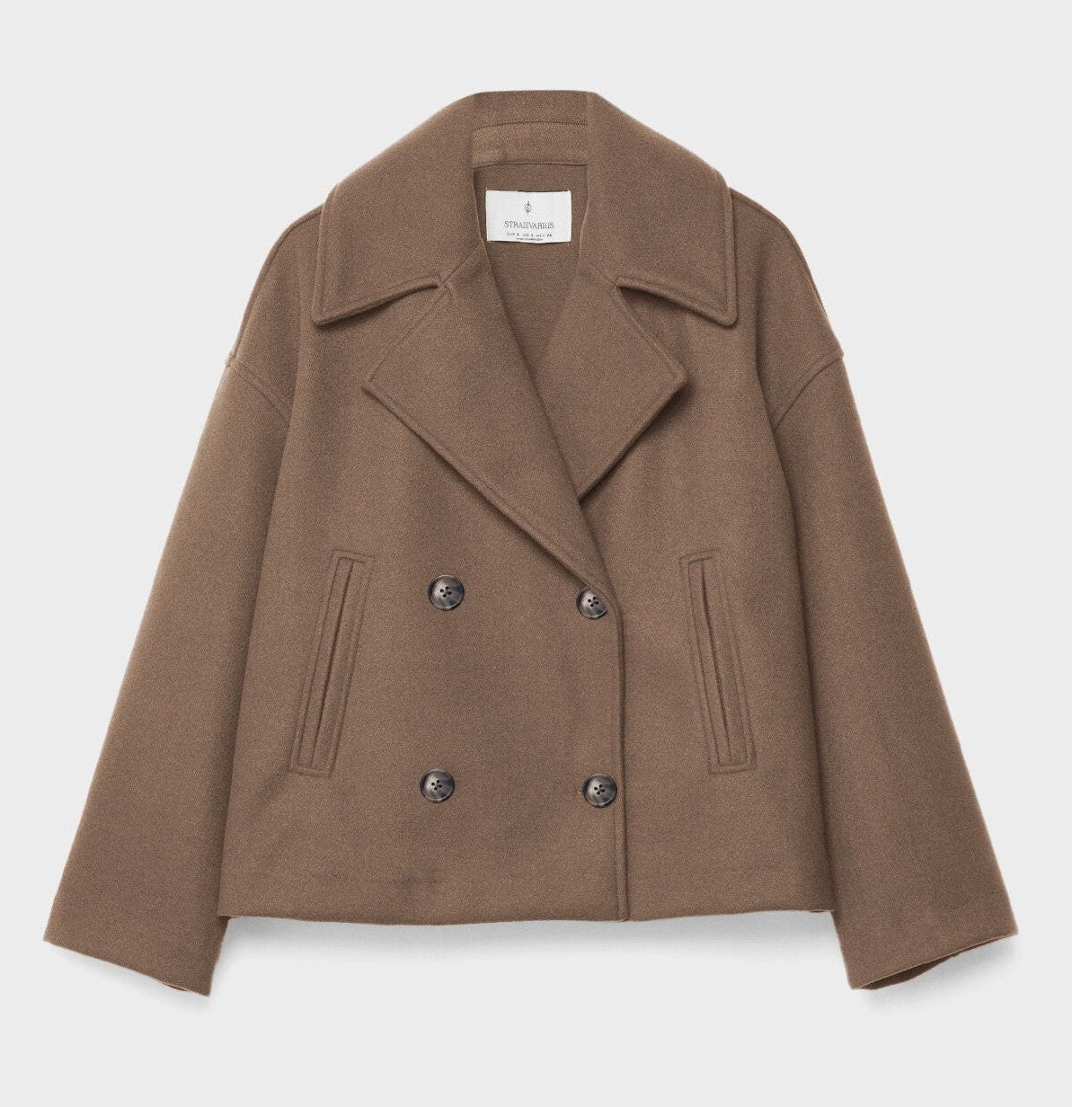 Short peacoat with a wide lapel and two rows of buttons