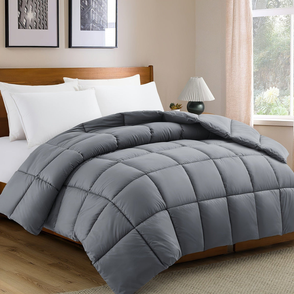 Quilted duvet without a cover on a made double bed - grey