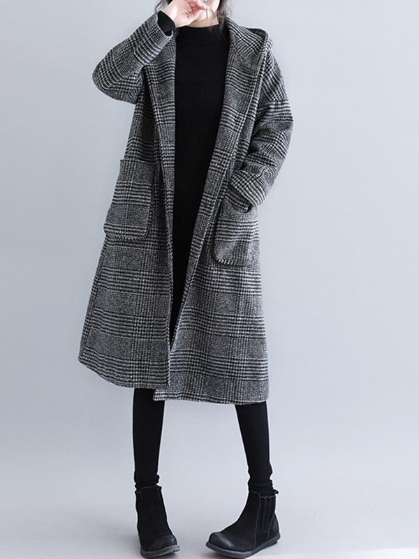 Hooded longline coat in a fine check with two patch pockets in black