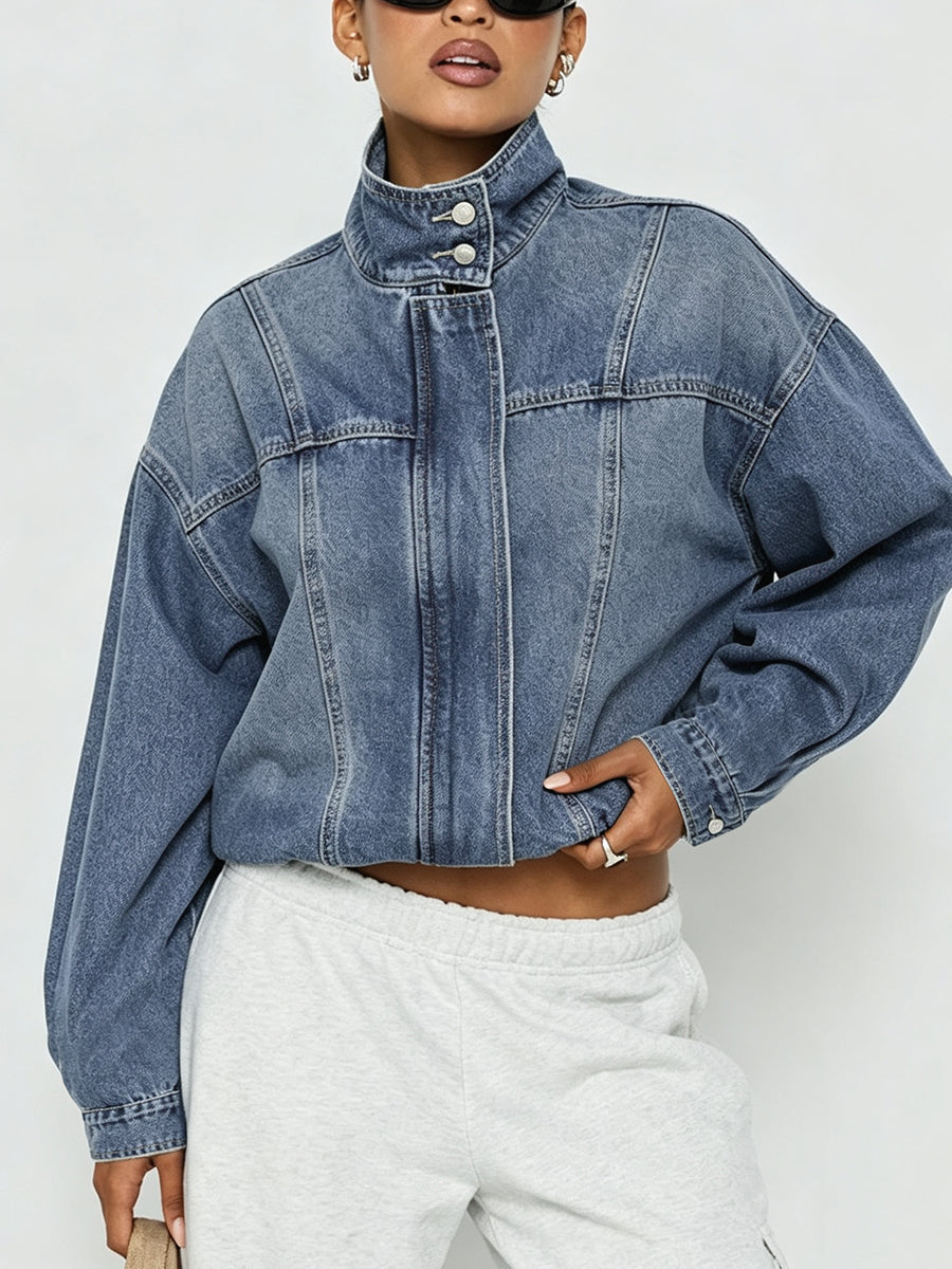 Cropped denim jacket with a high stand collar and balloon sleeves in mid wash