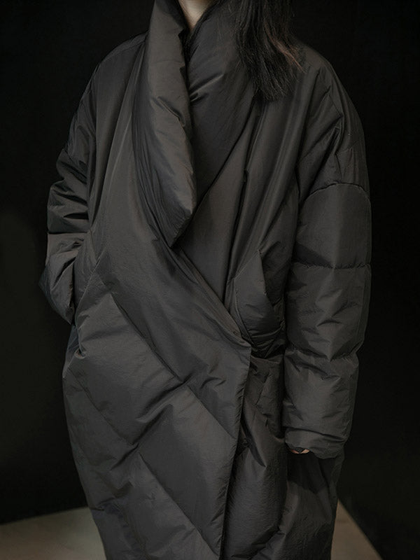Long black padded coat with a scarf collar and diagonal quilting