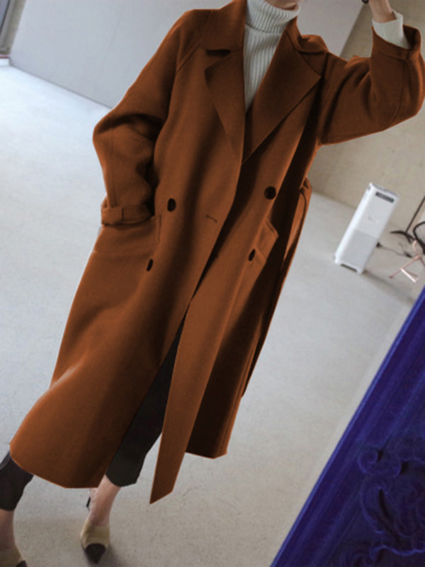Belted longline coat with a notch lapel and welt pockets