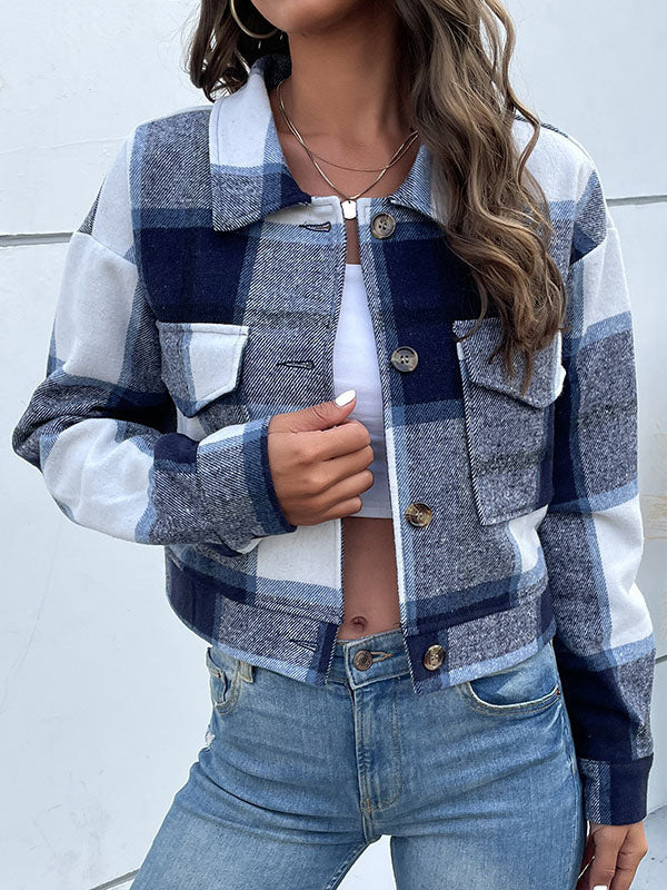 Cropped checked jacket with a pointed collar and two flap pockets
