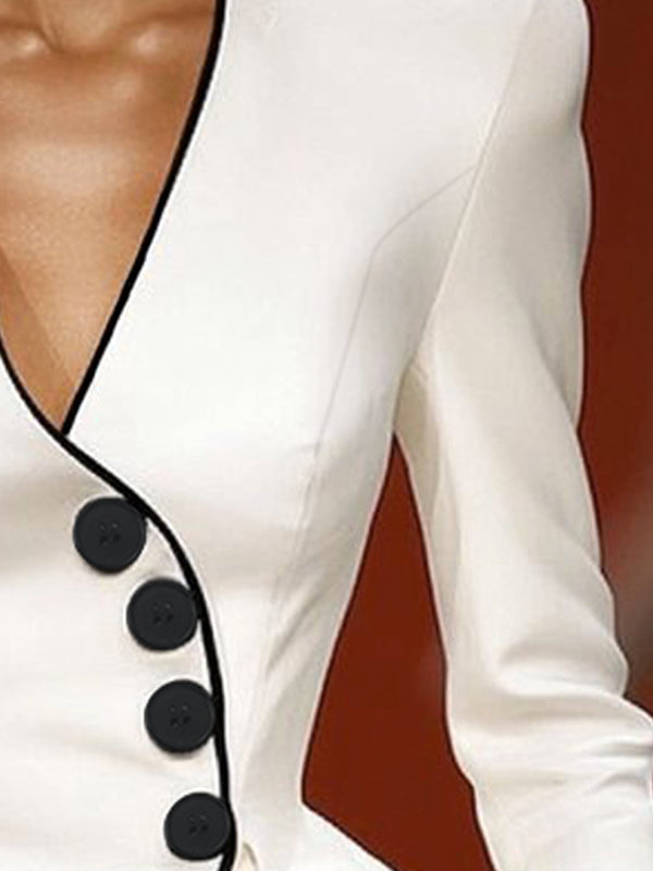 Close-up of the curved button front and contrast piping on a white peplum jacket