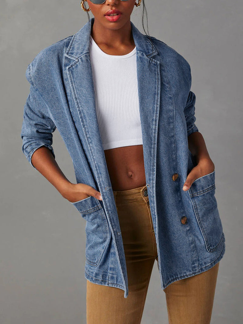Mid wash denim blazer with a notched collar and four patch pockets