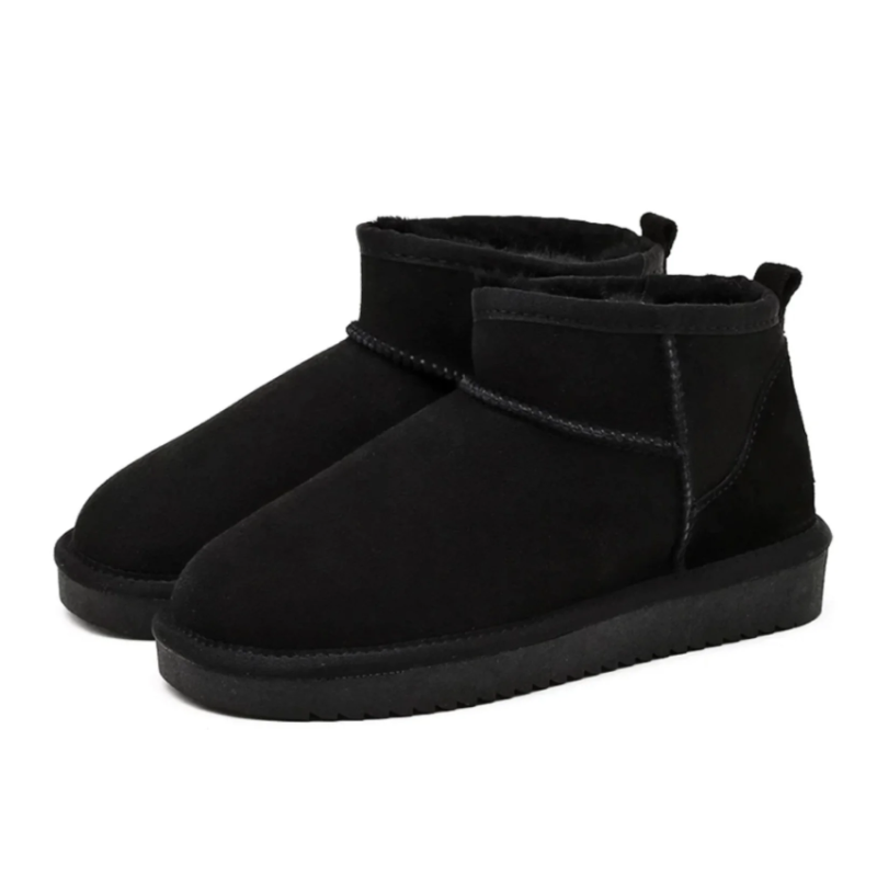 Women's faux fur-lined mini boots in a suede look in black