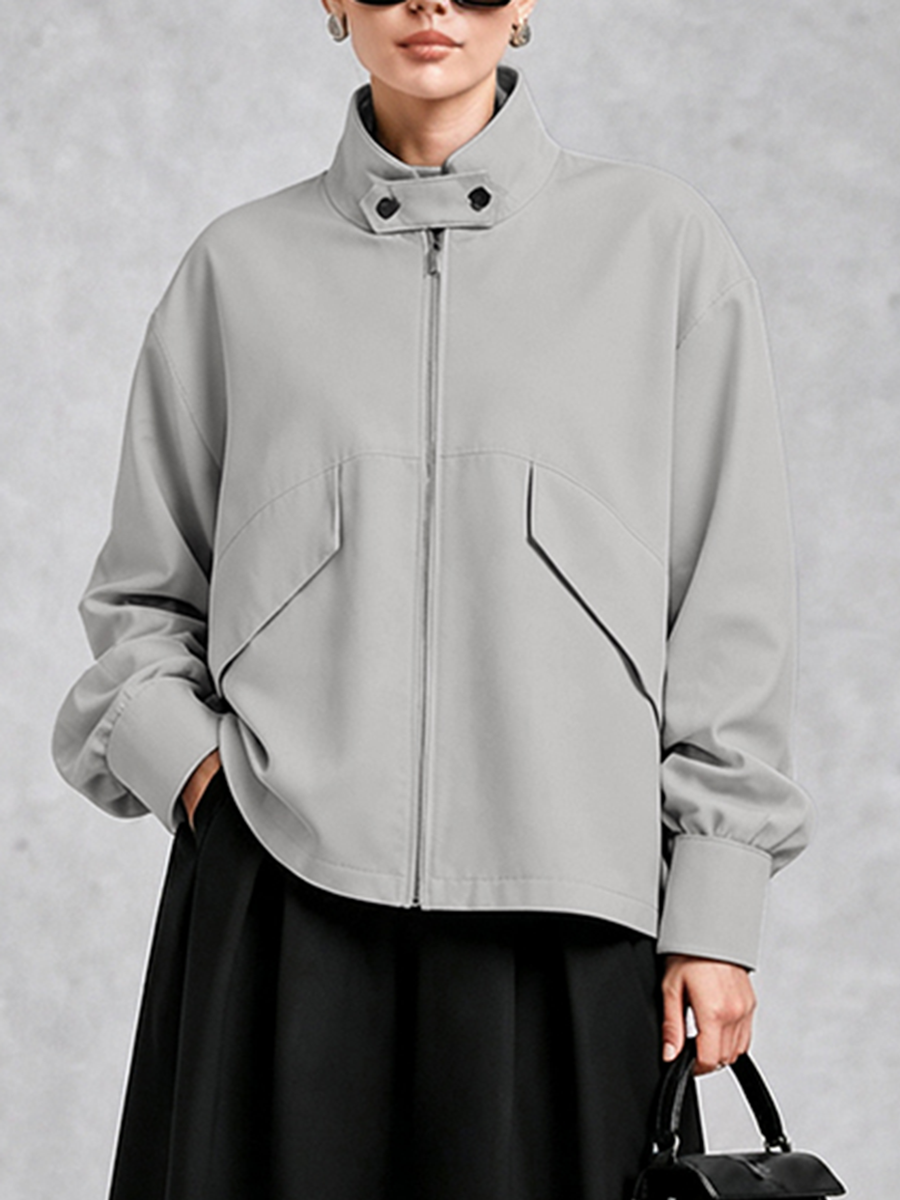 Oversized grey jacket with a high stand collar and zip front in grey