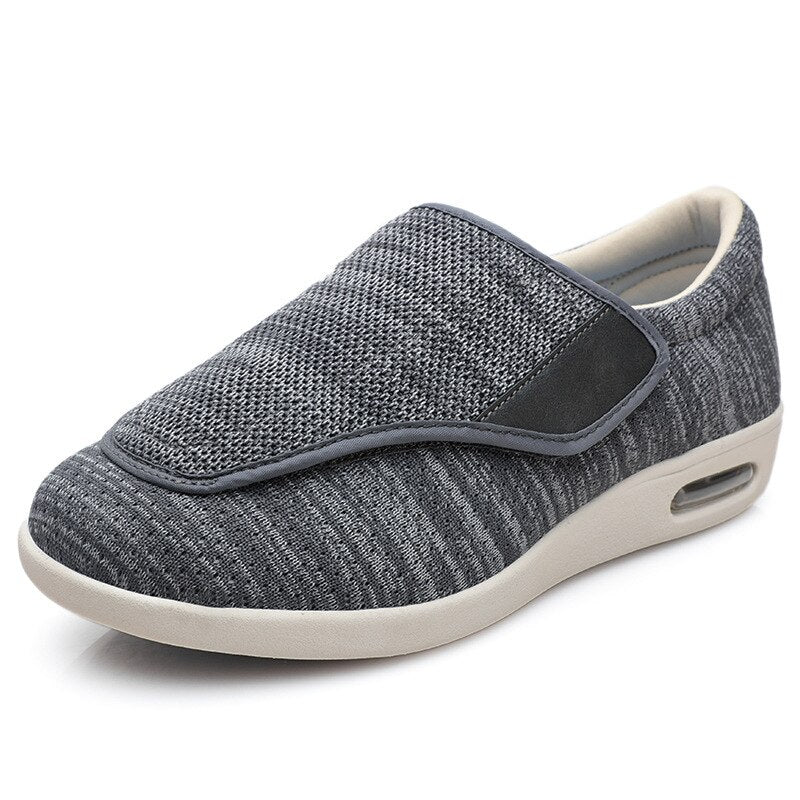 Ergonomic wide-fit shoes with an adjustable touch-fastening strap