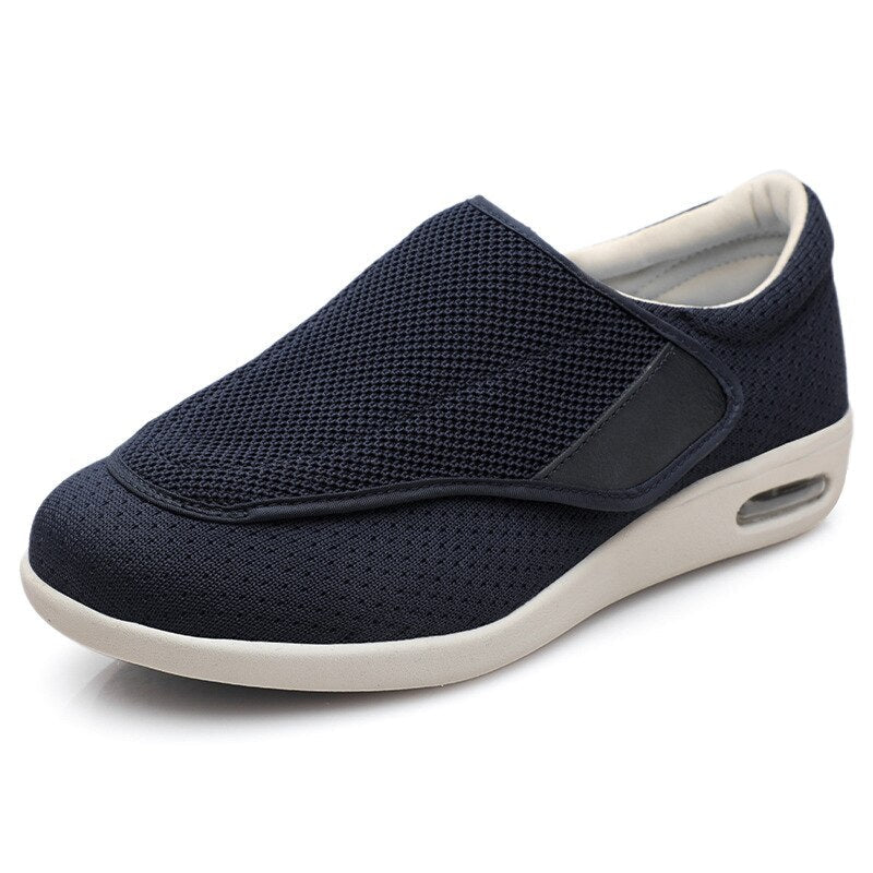 Ergonomic wide-fit shoes with an adjustable touch-fastening strap