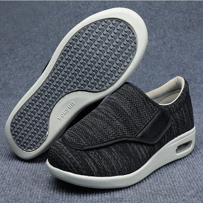 Ergonomic wide-fit shoes with an adjustable touch-fastening strap