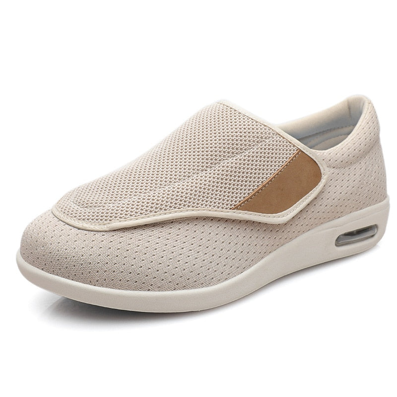 Ergonomic wide-fit shoes with an adjustable touch-fastening strap