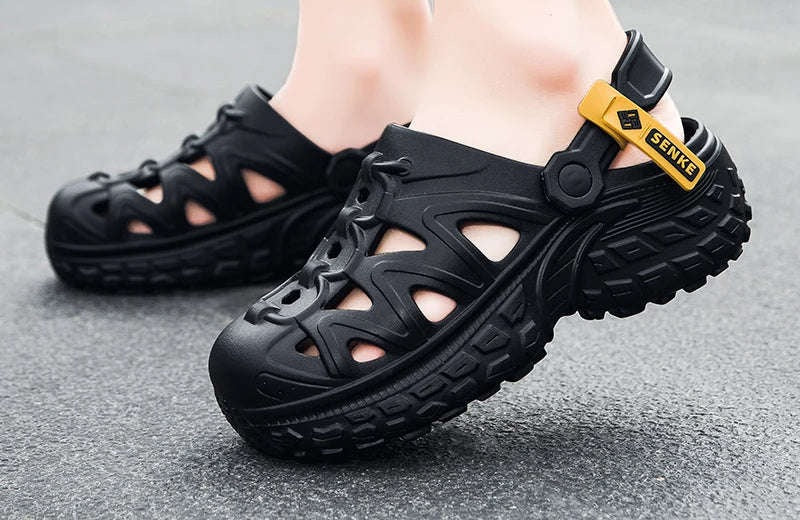 EVA clogs with large cut-outs, a pivoting heel strap and chunky tread sole - view 2