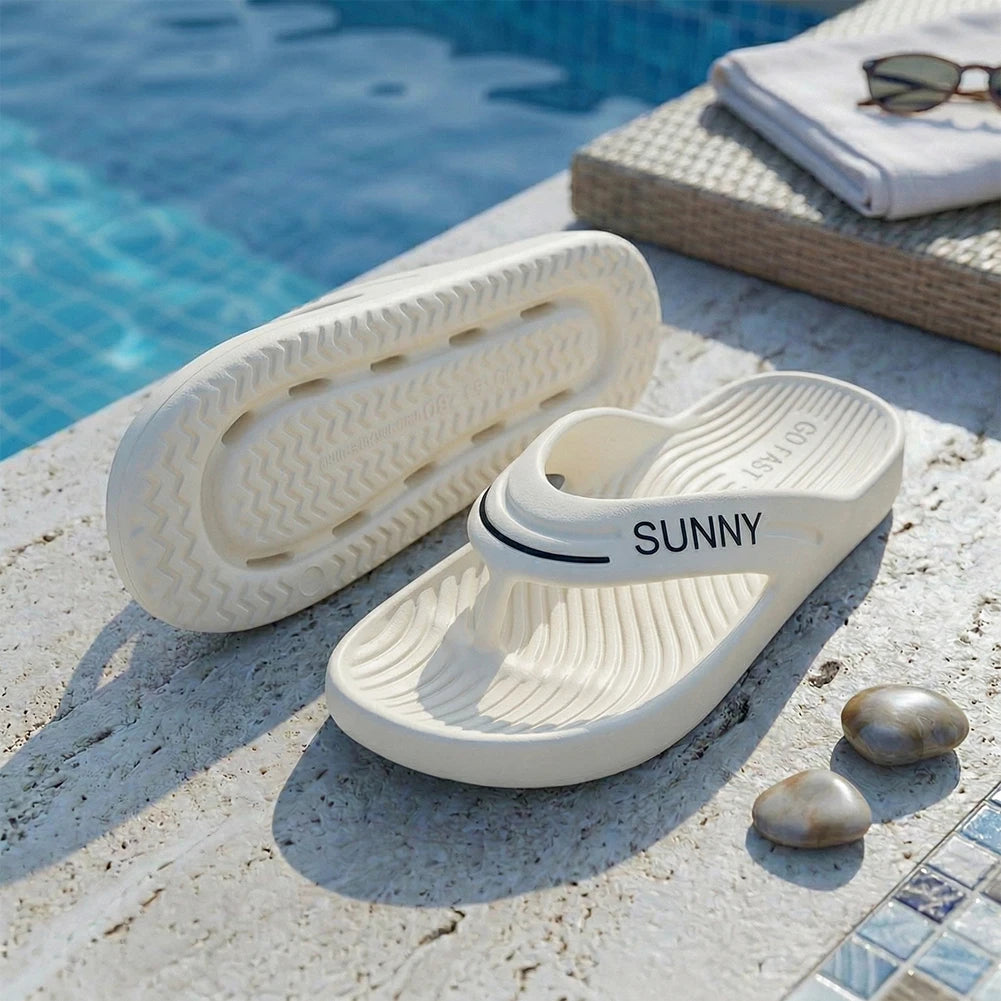 EVA flip flops with thick sole, wide V strap and wavy ribbed footbed - white