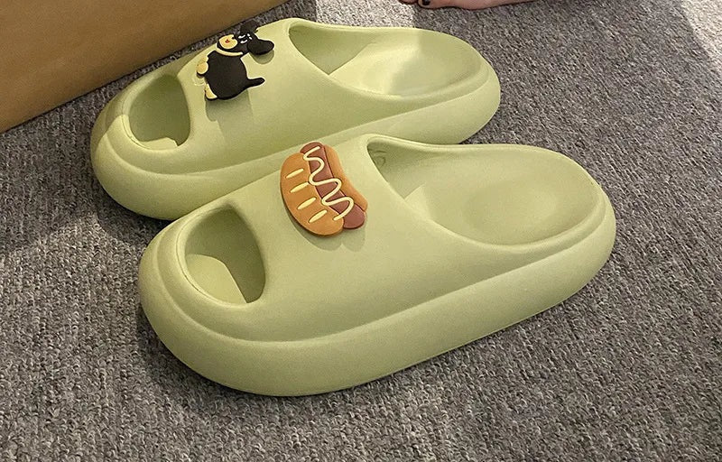 EVA mule slippers with closed toe, thick sole and playful charms on the instep - light green