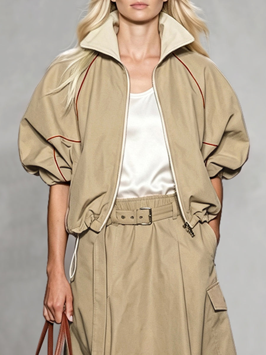 Khaki jacket with rust contrast piping and gathered puff sleeves in khaki