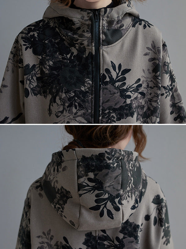 Grey hooded jacket printed with dark flowers and a full-length zip