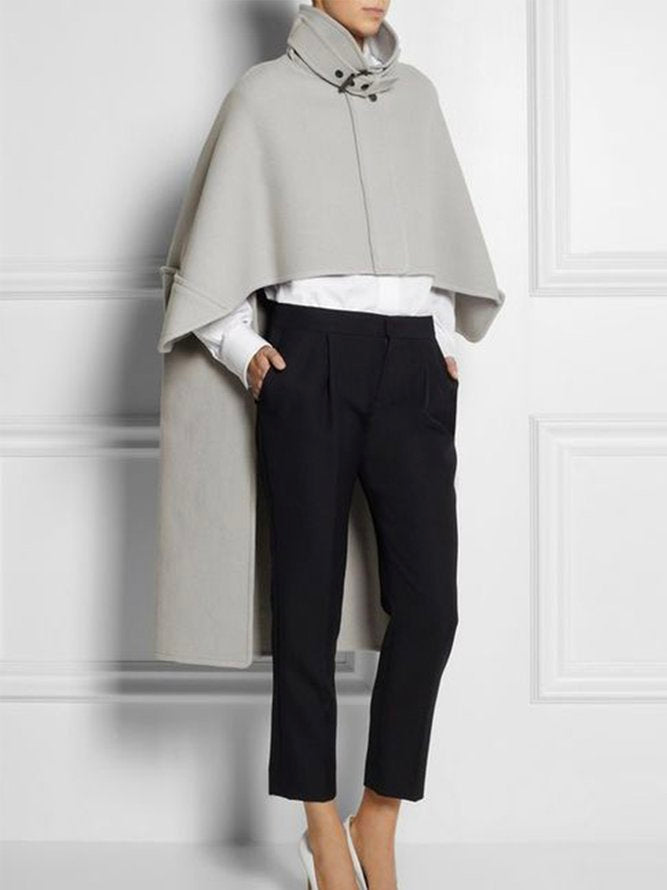 Grey wool-look cape with a stand collar and two buckle tabs in grey
