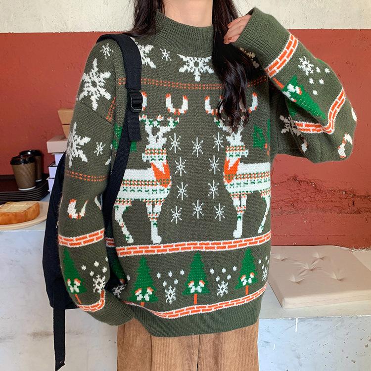 Women's knitted Christmas jumper with two Fair Isle reindeer, snowflakes and trees