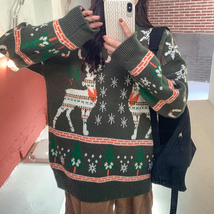 Women's knitted Christmas jumper with two Fair Isle reindeer, snowflakes and trees