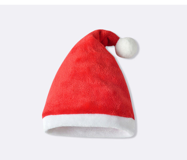 Red plush Father Christmas babygrow with a white beard and a matching hat