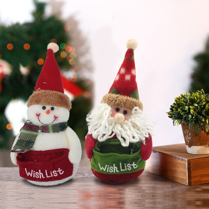 Plush Father Christmas and snowman in knitted hats, each with a Wish List pouch