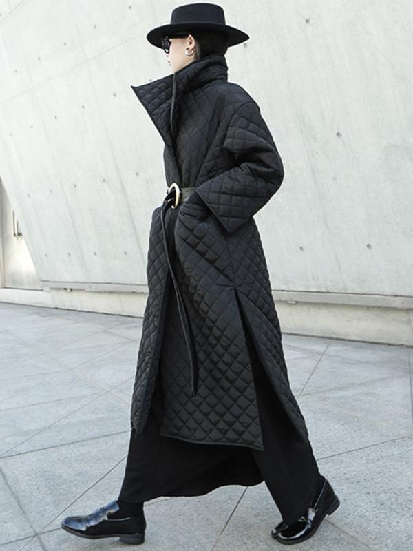 Long black quilted wrap coat with a fold-over collar and ring-buckle belt