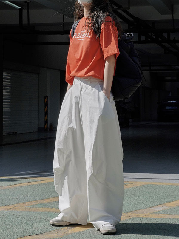 Wide-leg barrel trousers in cotton with curved knee seams