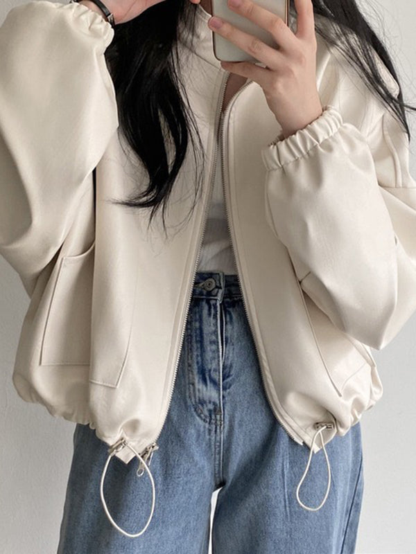 Oversized faux leather bomber jacket with a stand collar and drawstring hem