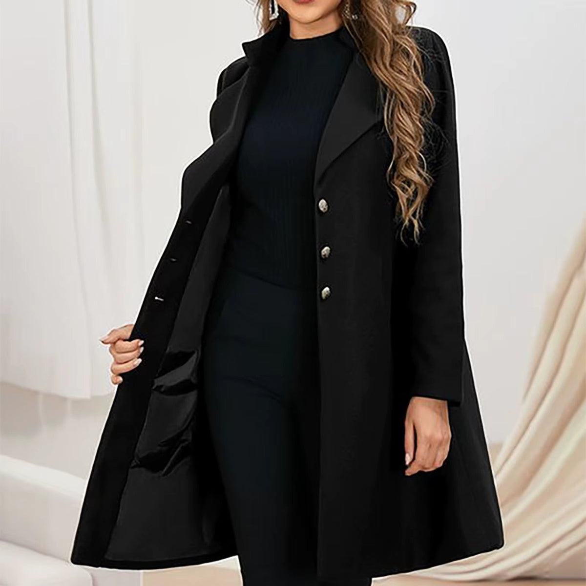 Women's fitted flared coat with wide lapels and a button front - black