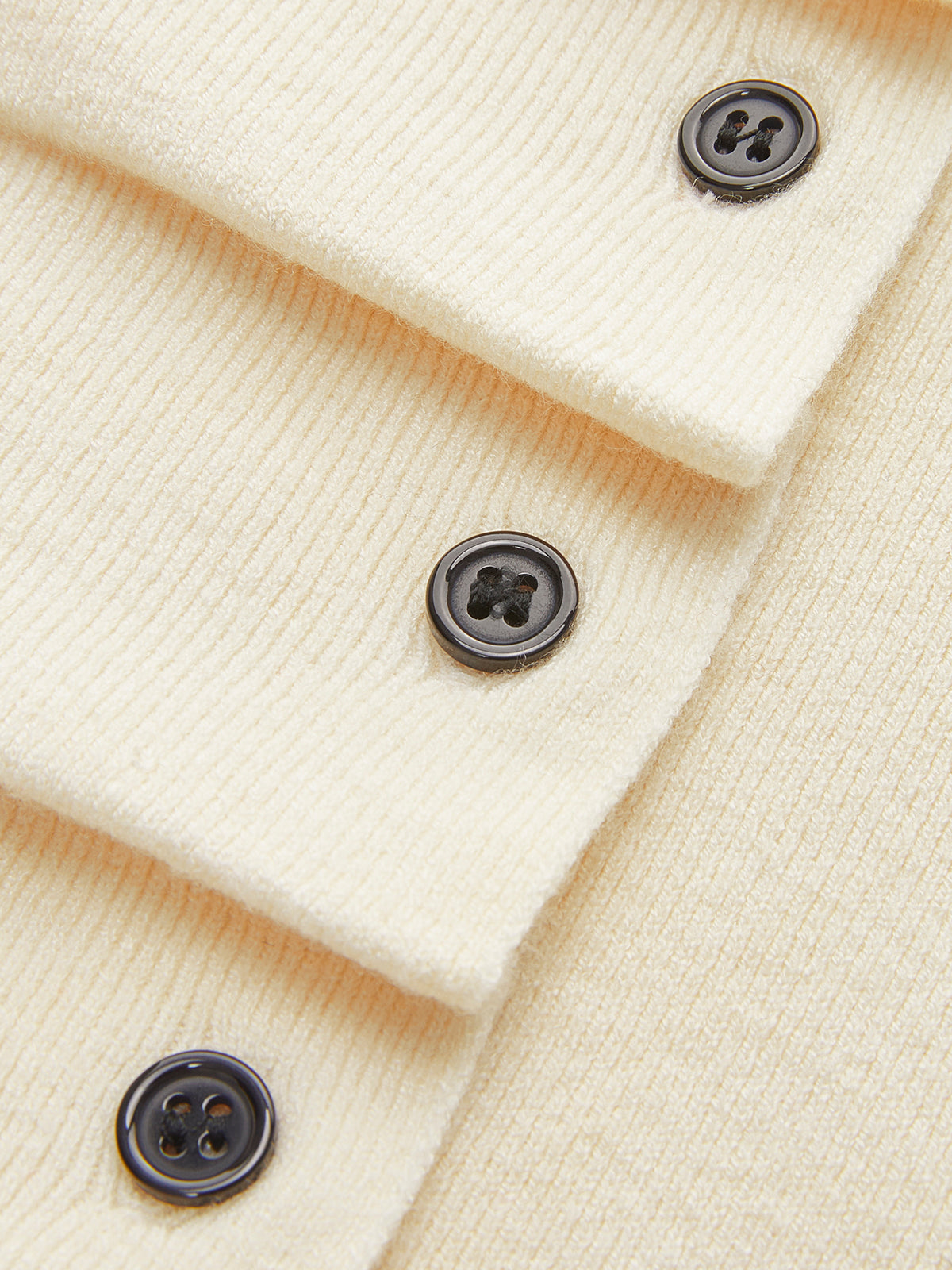 Women's fitted cardigan with a mock neck and pleated button front